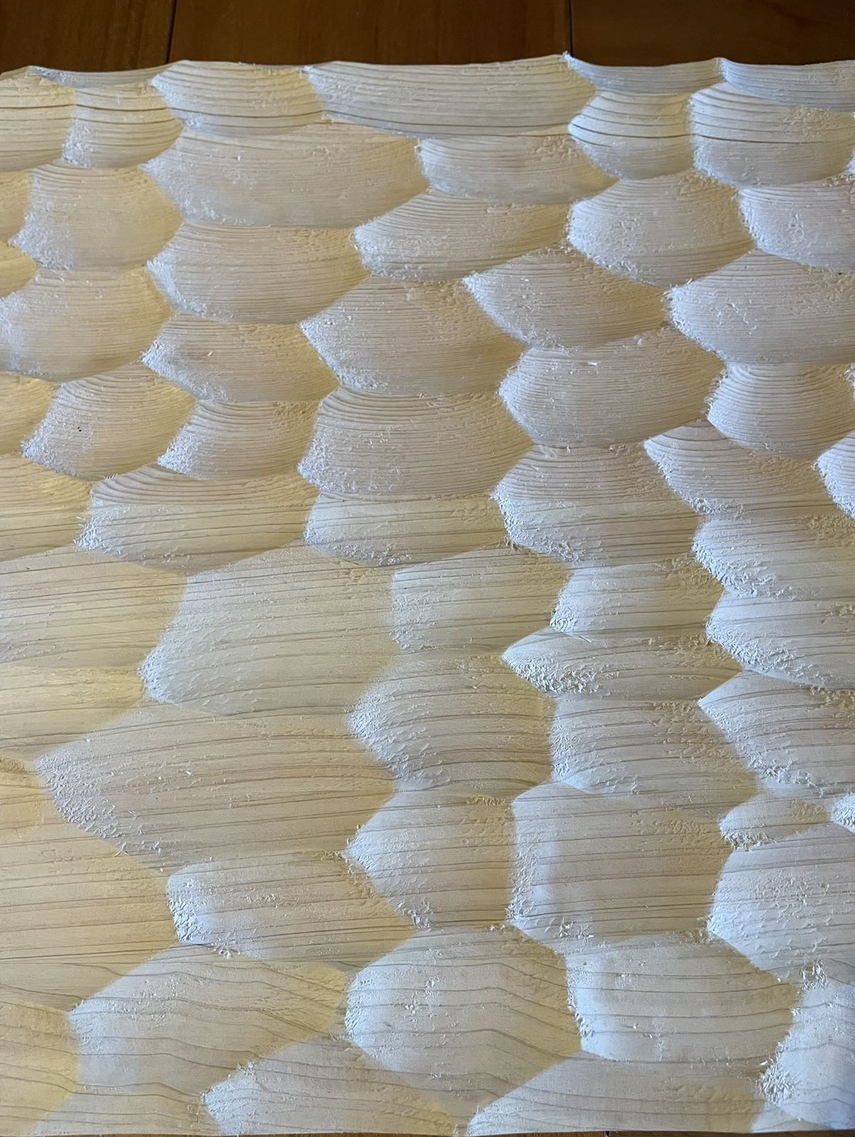 Hand-chiseled decorative timber surface